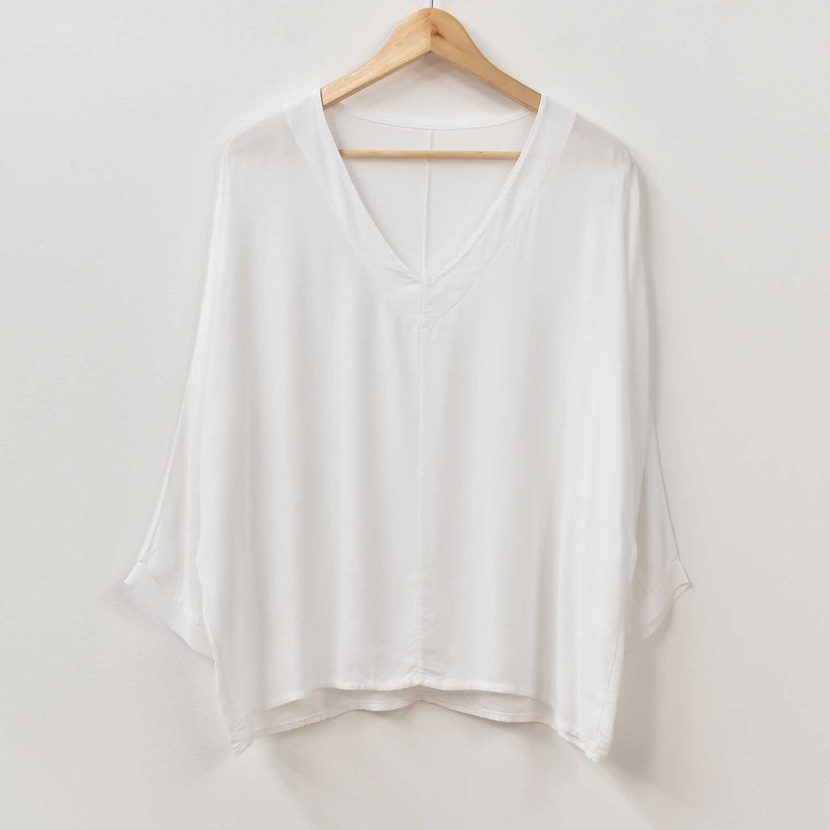 Blusa Pico Elegance – Blanca