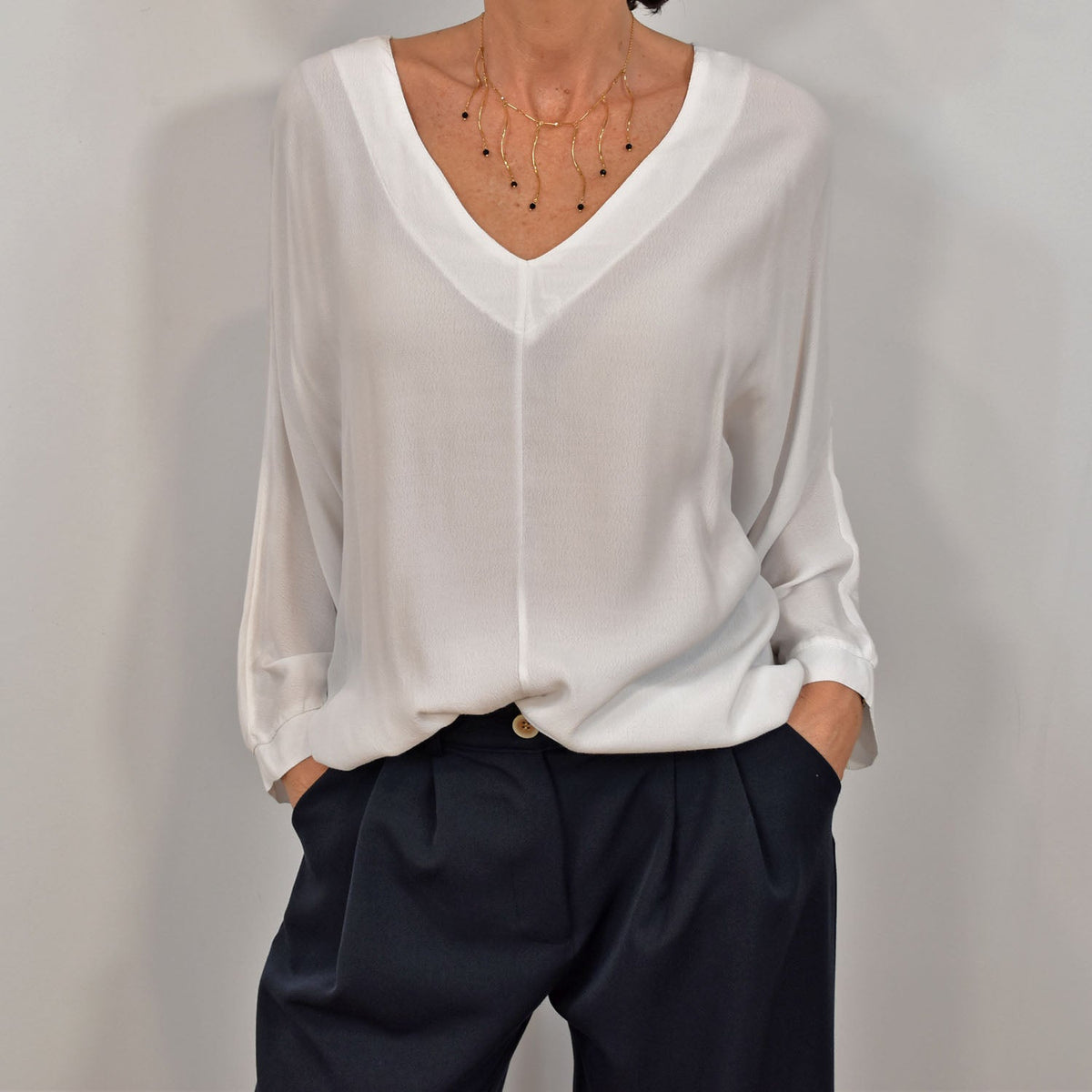 Blusa Pico Elegance – Blanca